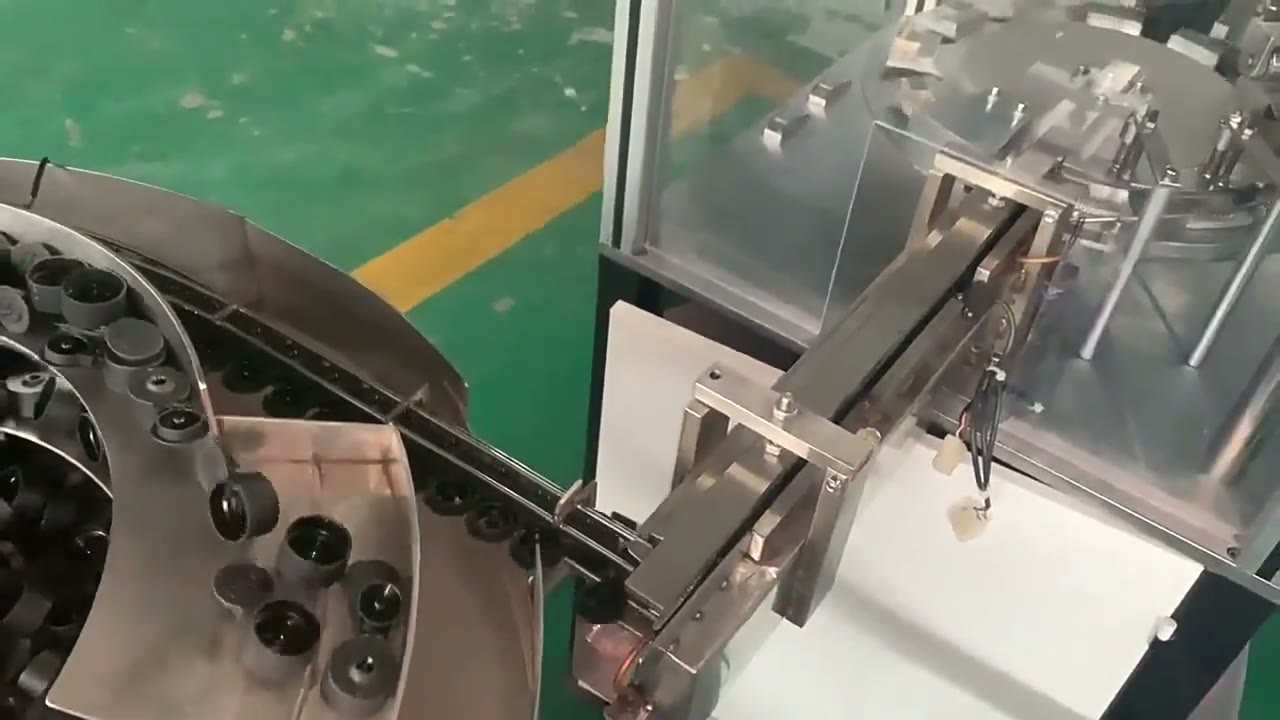 Multi-Part Flip-Top Cap Assembly Machine AM-TY-04
